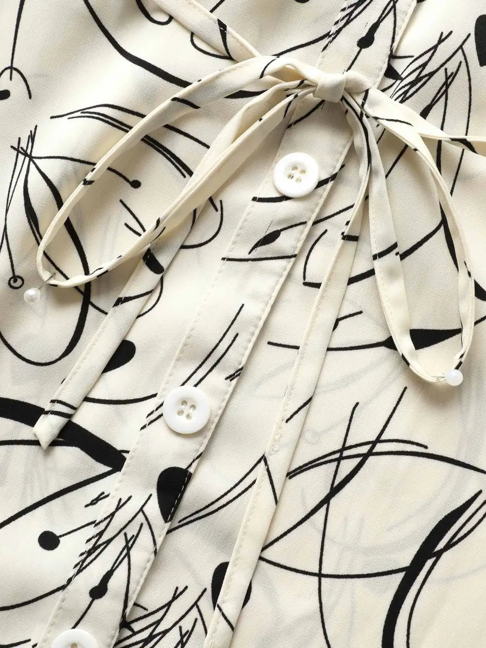 Geometric Print Drawstring Cuffed Sleeve Blouse