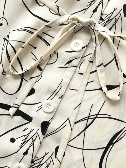 Geometric Print Drawstring Cuffed Sleeve Blouse